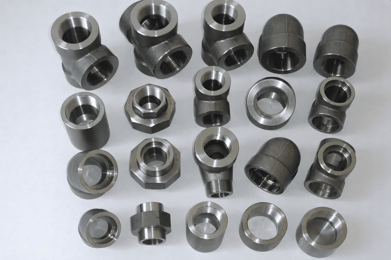 Forged carbon steel threaded fittings: tees, elbows, unions, couplings and caps